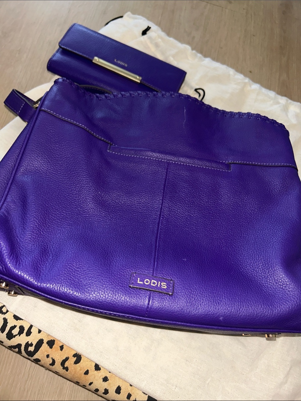 LODIS purple leather satchel with matching wallet